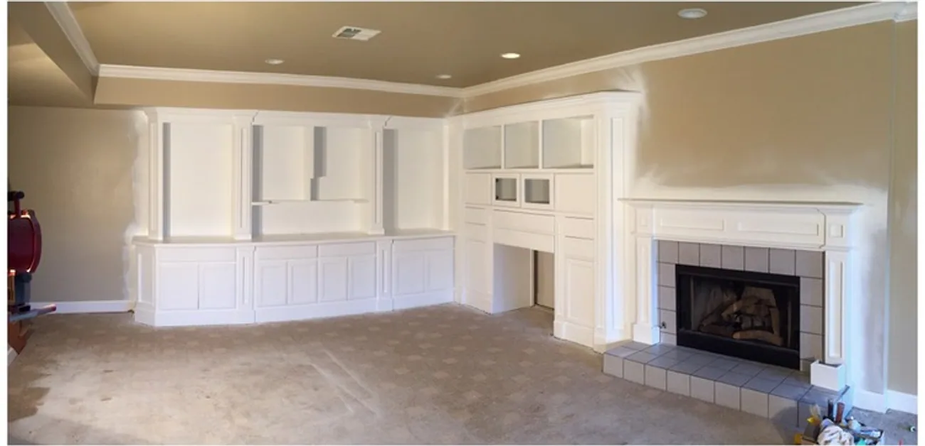 The same living room after Talbot Painting finished the built-ins and mantel in white