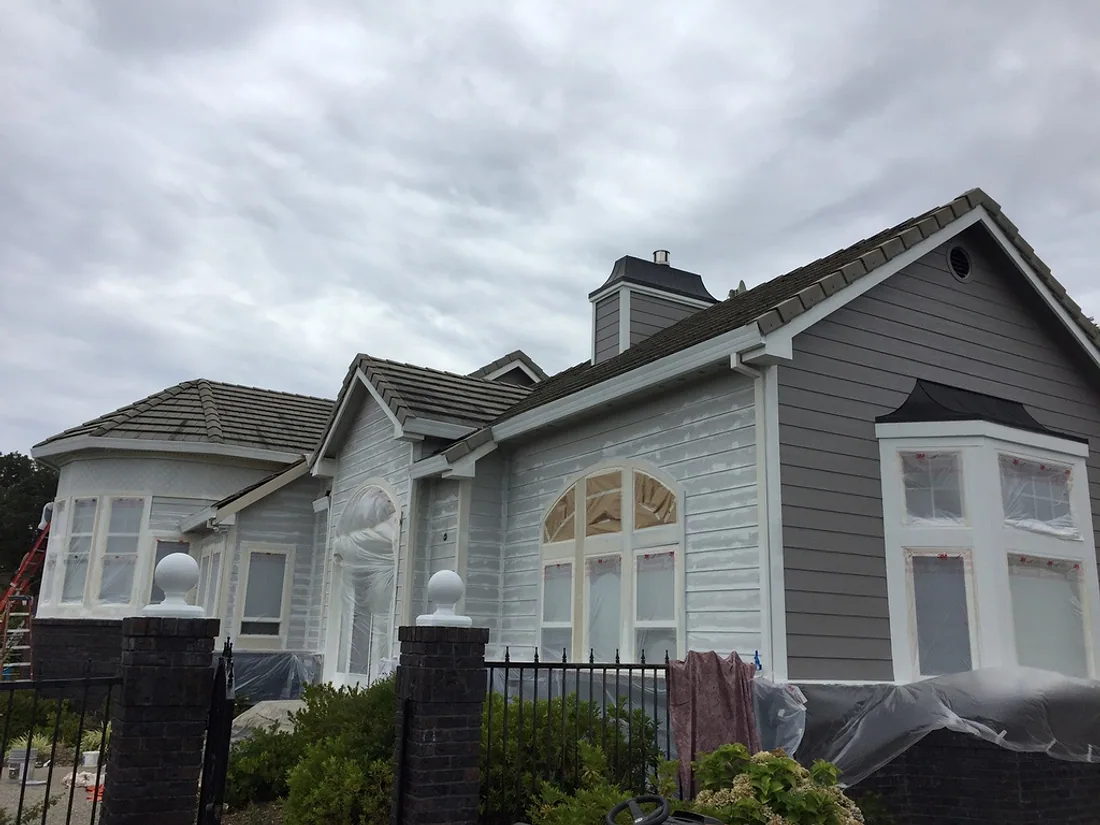 A two-storey Redding home after an exterior repaint by Talbot Painting